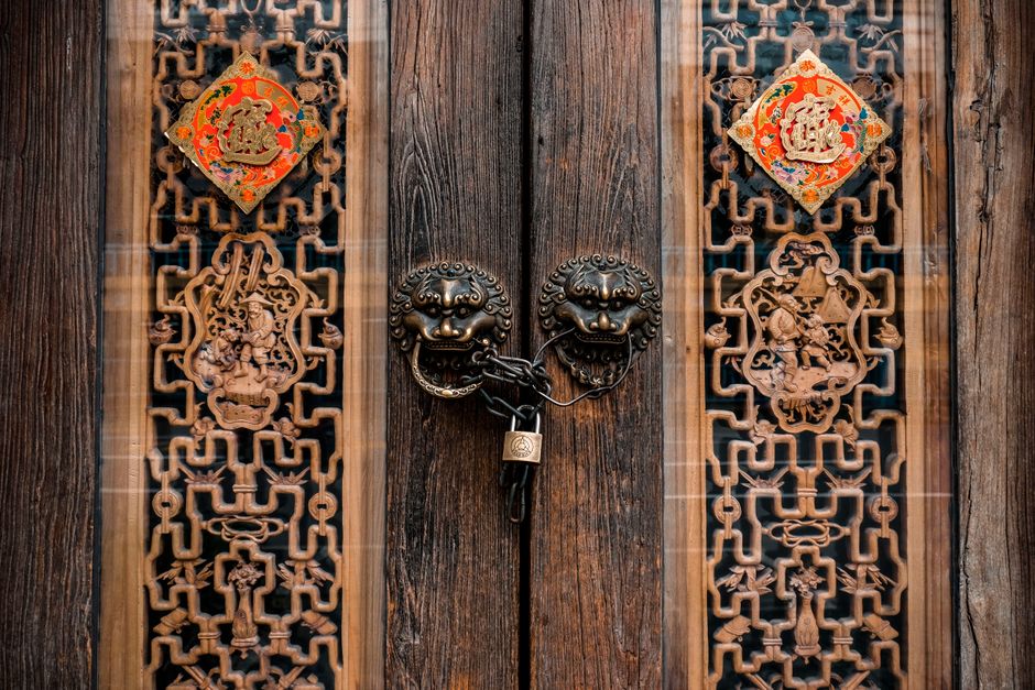 ornate traditional wooden doorway with carved details