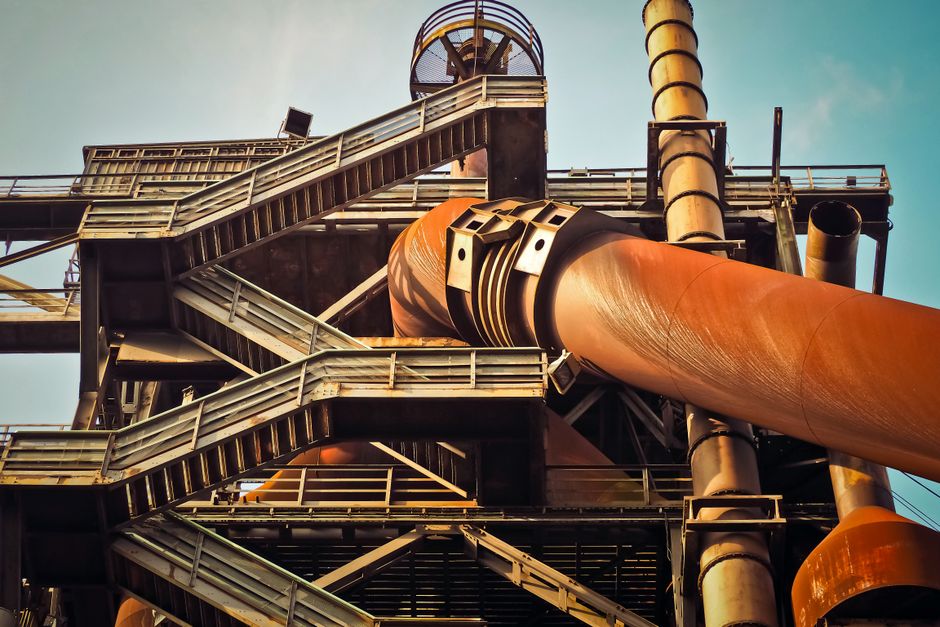 industrial steel facility with heavy machinery and metal beams