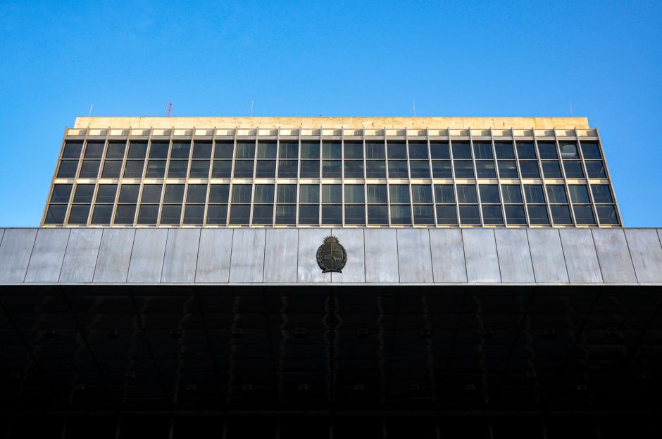 Urban architecture of a government building with a clear blue sky in Montevideo, Uruguay.