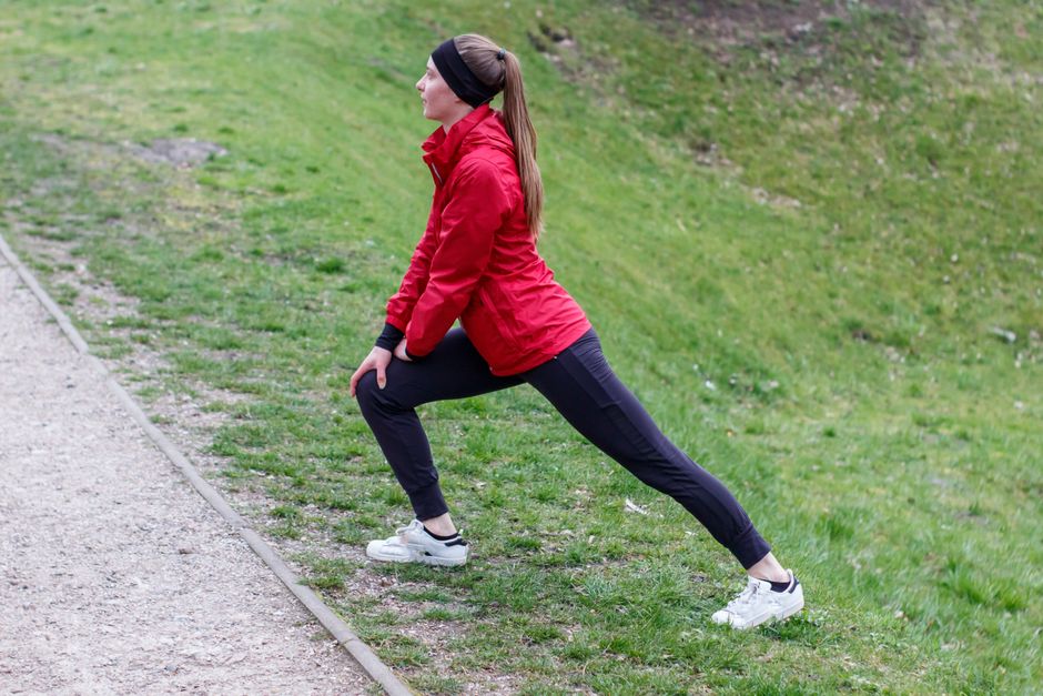 A woman Doing Stretching outside