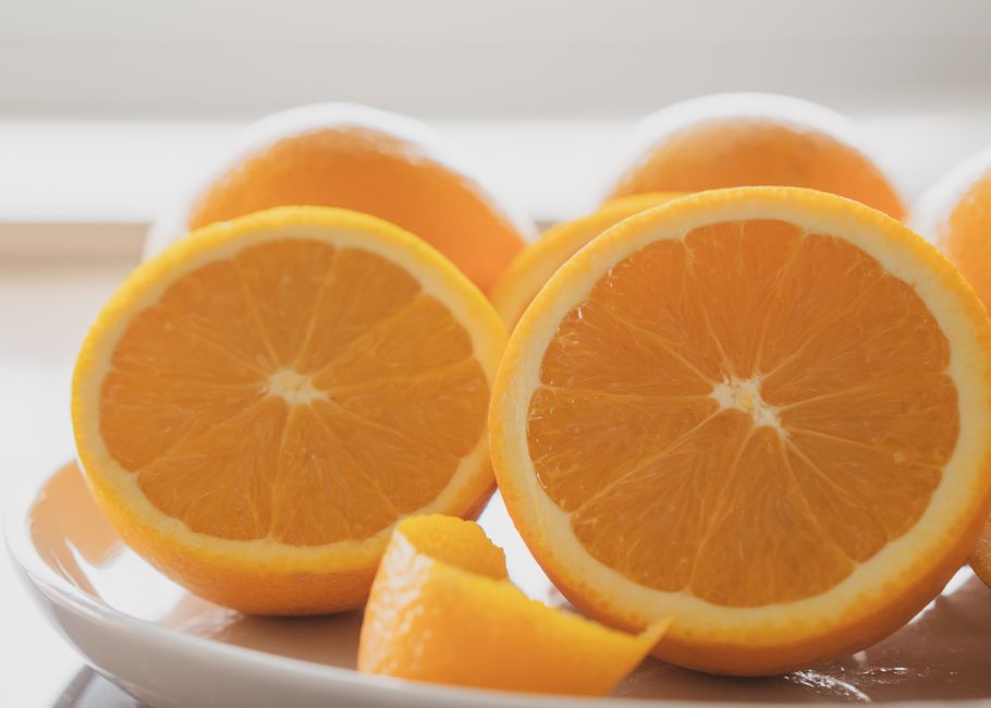 Close-up of vibrant orange slices showcasing freshness and vitamin C boost.