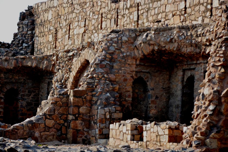 Explore the ancient stone ruins of a Mughal era fort in New Delhi, India.